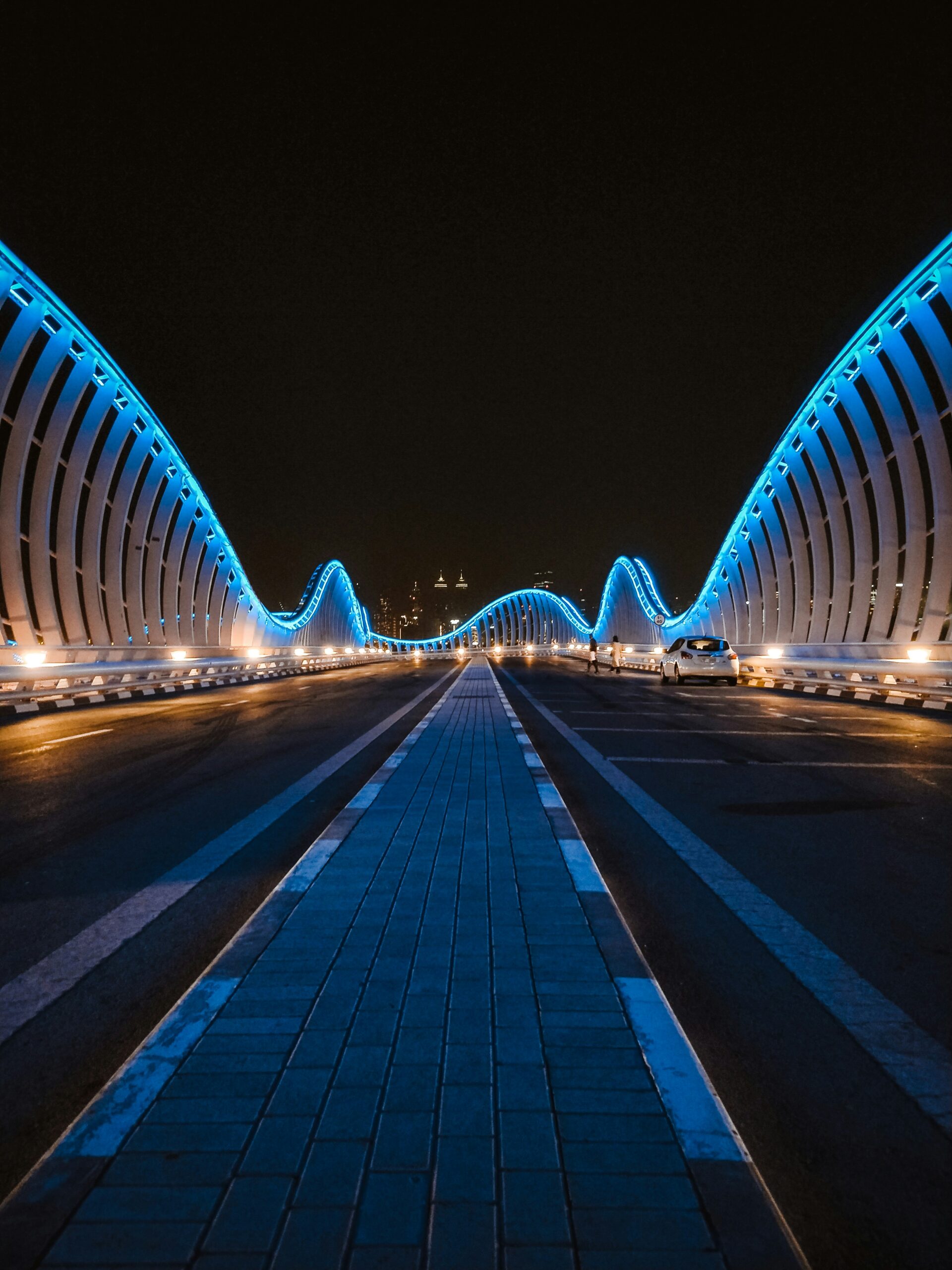 a bridge that is lit up at night