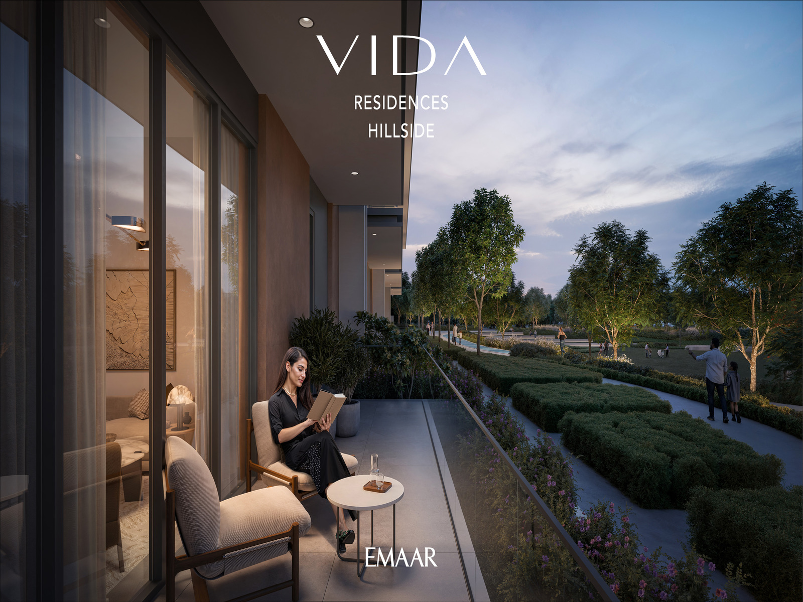a woman sitting on a chair on a balcony