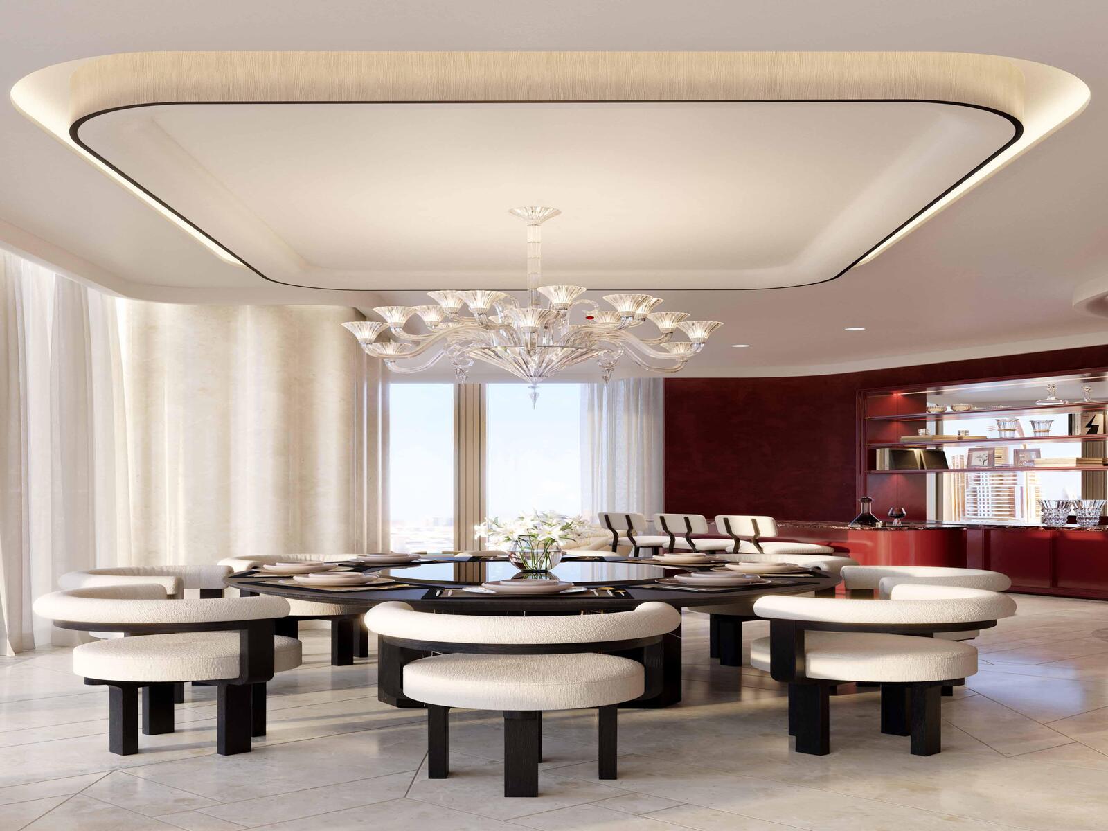 a dining room with a large table and chairs