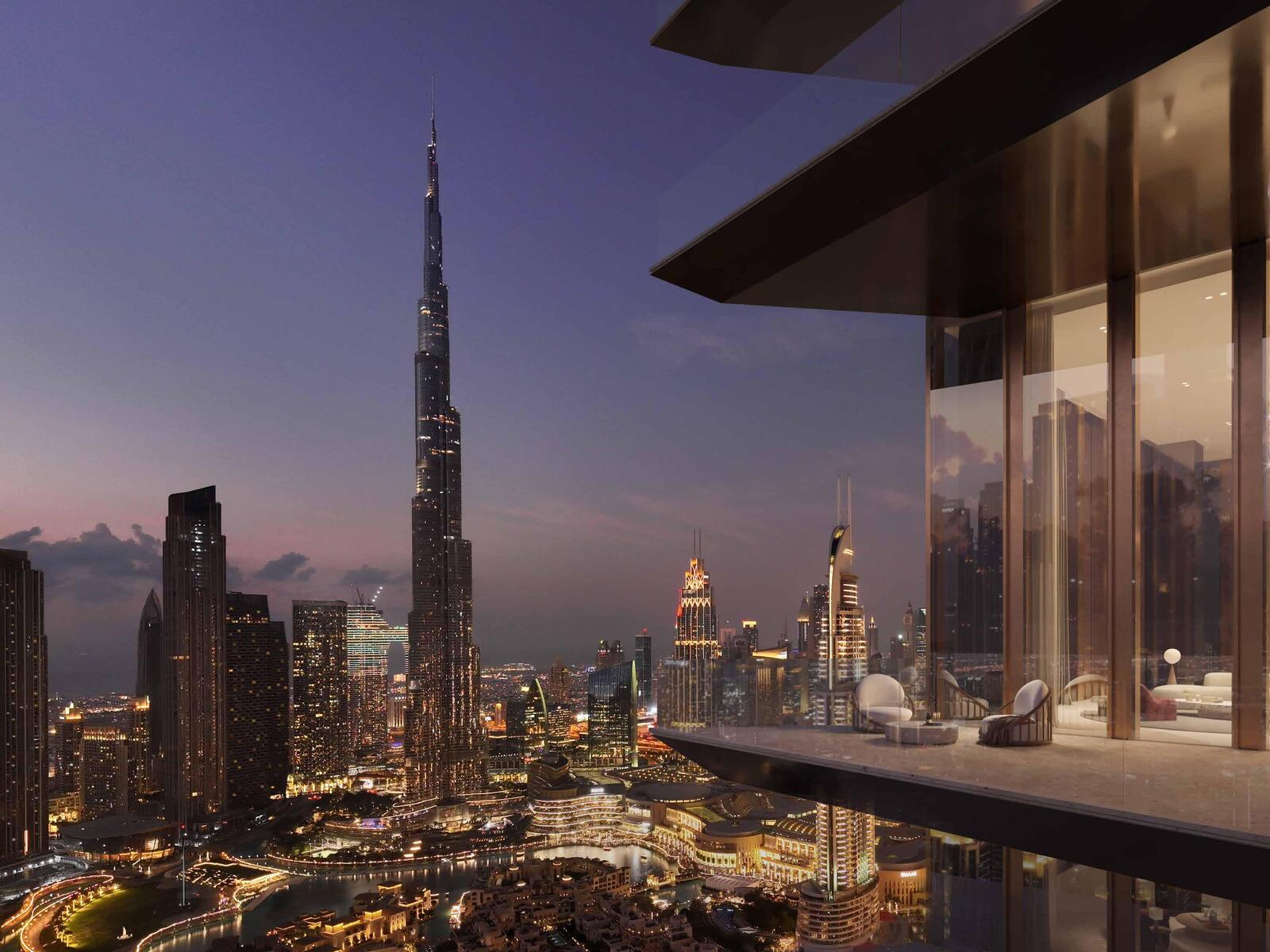 a view of a city at night from a rooftop